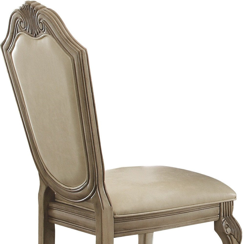 Set of Two Antiqued White Upholstered Faux Leather Dining Side Chairs HomeRoots