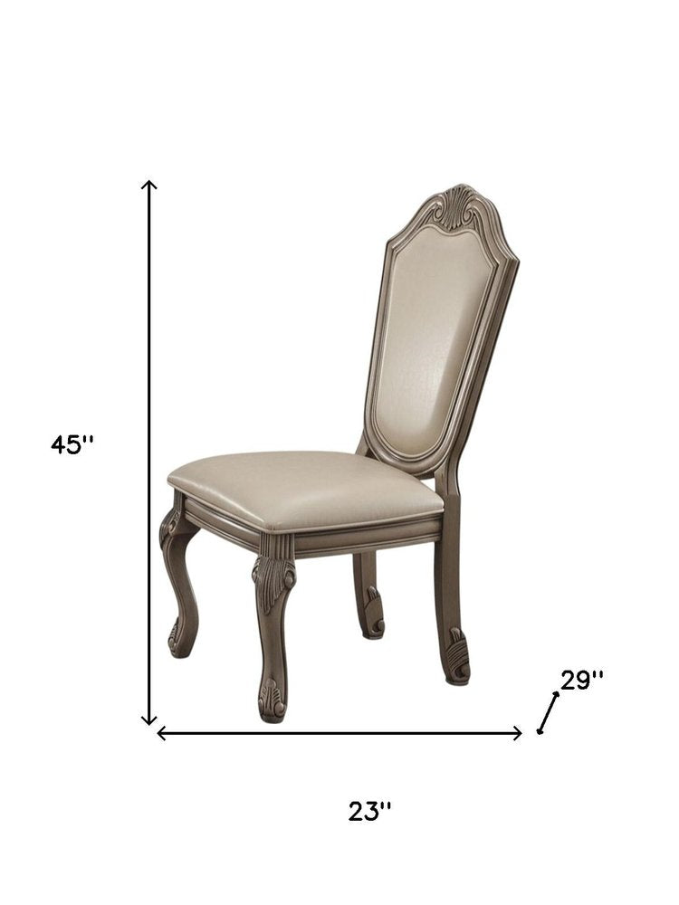 Set of Two Antiqued White Upholstered Faux Leather Dining Side Chairs HomeRoots