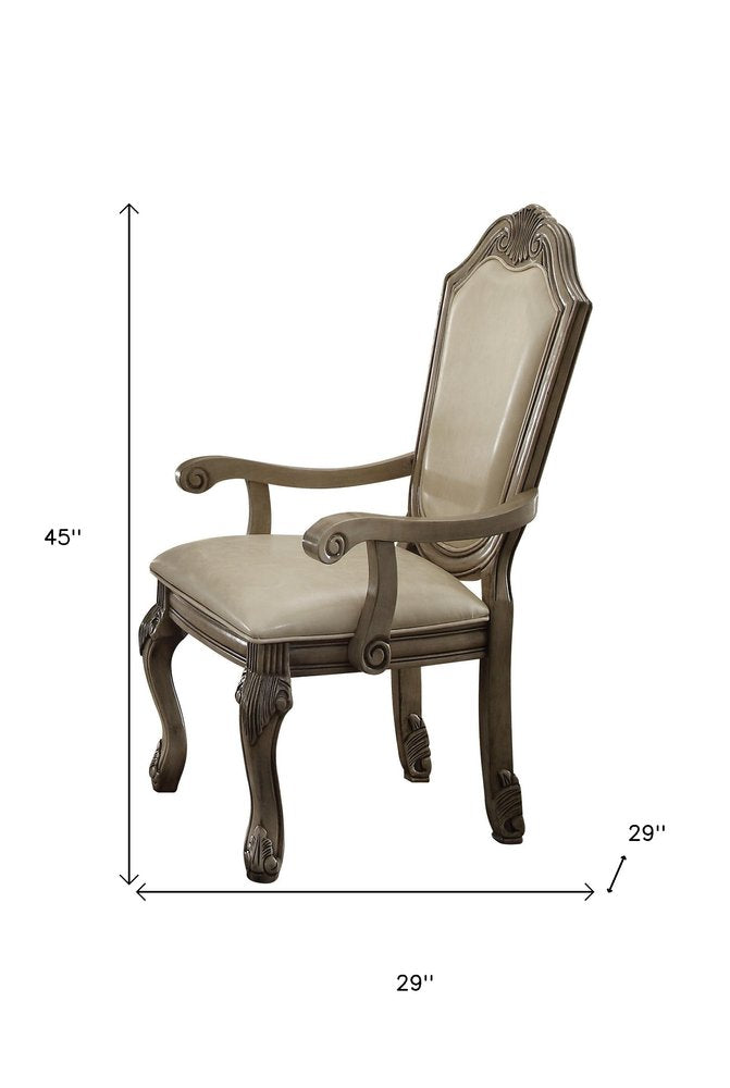 Set of Two Antiqued White Upholstered Faux Leather Dining Side Chairs HomeRoots