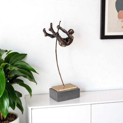 15" Bronze Resin Pole Vaulting Man Tabletop Sculpture HomeRoots
