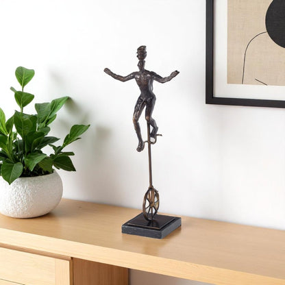 16" Bronze Resin Unicycle Man Tabletop Sculpture HomeRoots
