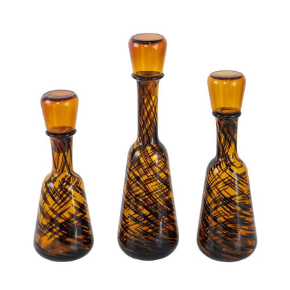 Set of Three Amber Abstract Swirl Glass Decorative Bottles With Stoppers HomeRoots