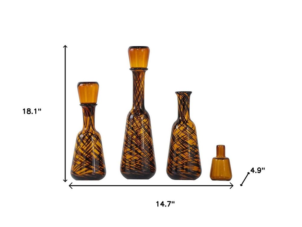 Set of Three Amber Abstract Swirl Glass Decorative Bottles With Stoppers HomeRoots