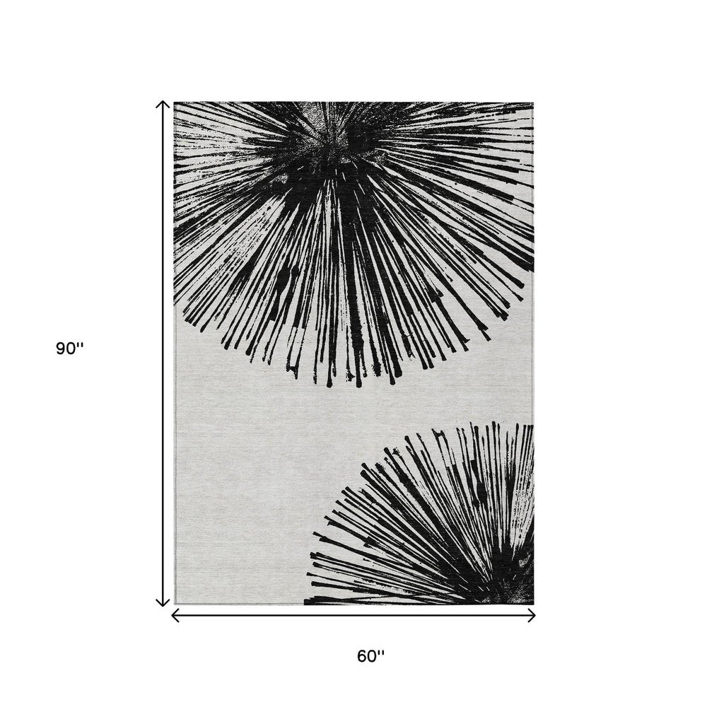 5' X 8' Black And Ivory Abstract Washable Indoor Outdoor Area Rug HomeRoots