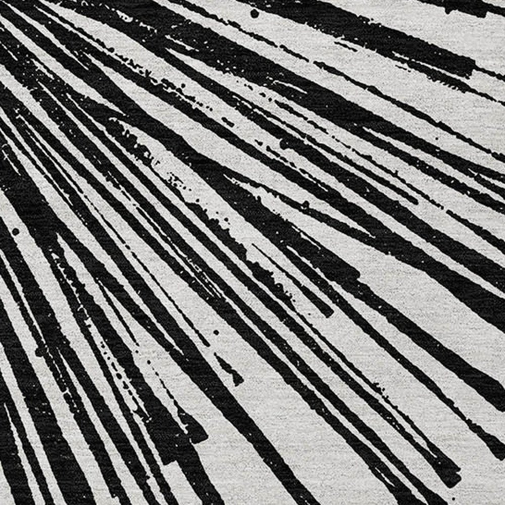 5' X 8' Black And Ivory Abstract Washable Indoor Outdoor Area Rug HomeRoots