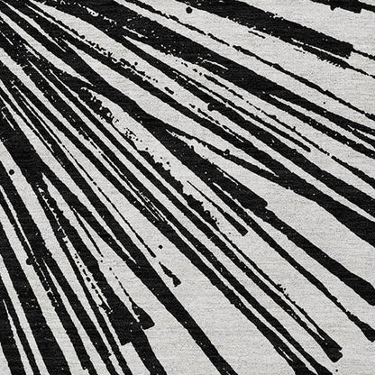 5' X 8' Black And Ivory Abstract Washable Indoor Outdoor Area Rug HomeRoots
