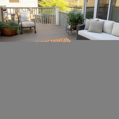 5' X 8' Orange And Ivory Geometric Washable Indoor Outdoor Area Rug HomeRoots