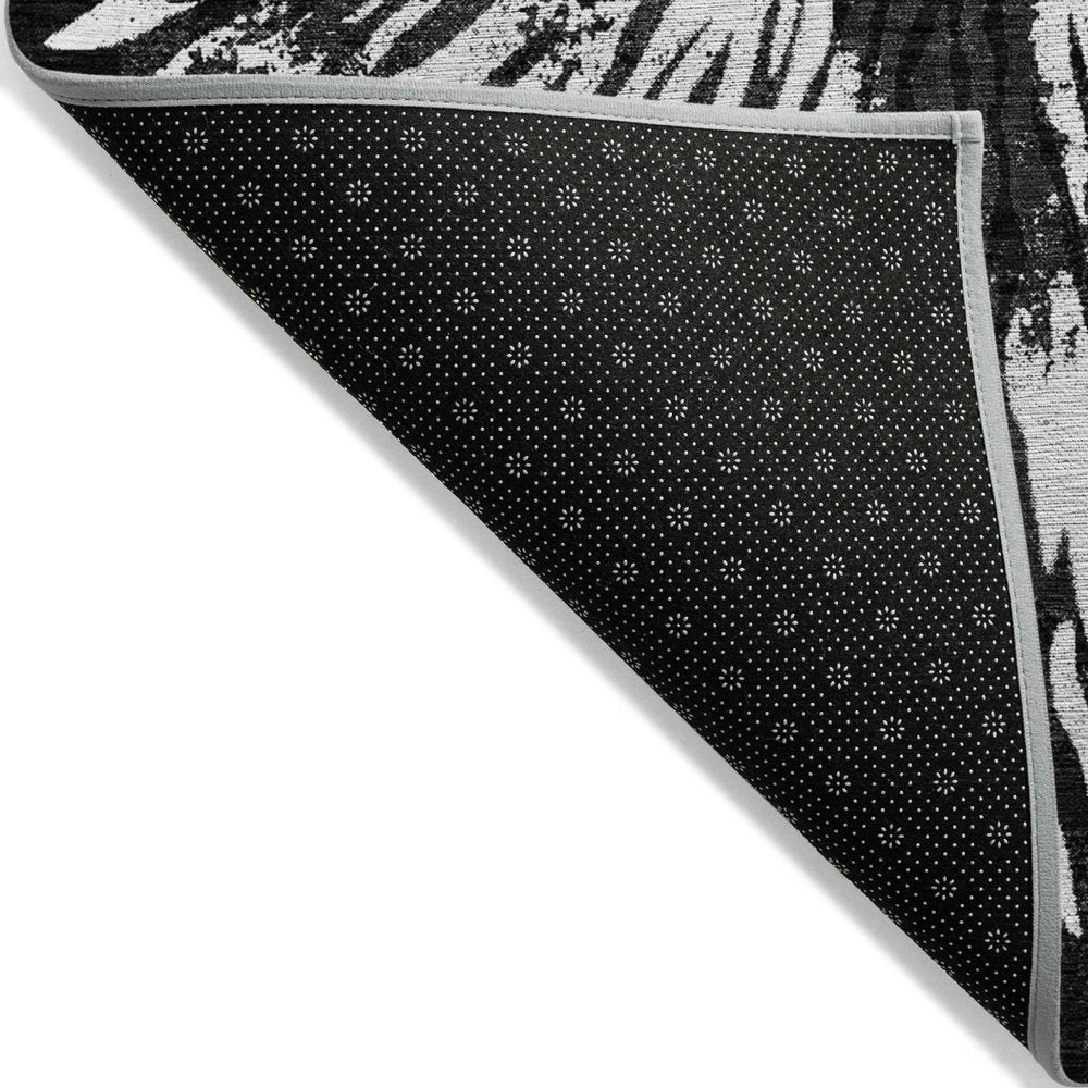 5' X 8' Black Charcoal And Ivory Abstract Washable Indoor Outdoor Area Rug