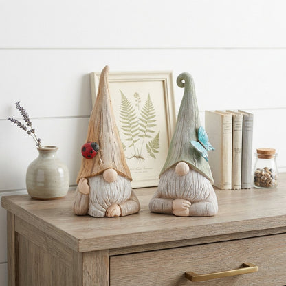 Set of Two Green Ivory And Light Brown Resin Gnome Tabletop Sculptures HomeRoots