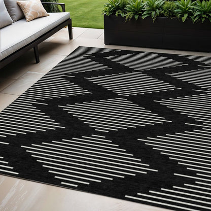5' X 8' Black And Ivory Geometric Washable Indoor Outdoor Area Rug HomeRoots