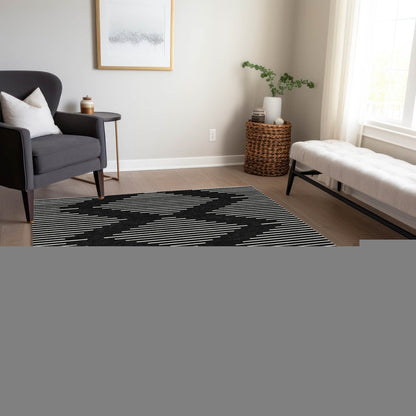 5' X 8' Black And Ivory Geometric Washable Indoor Outdoor Area Rug HomeRoots
