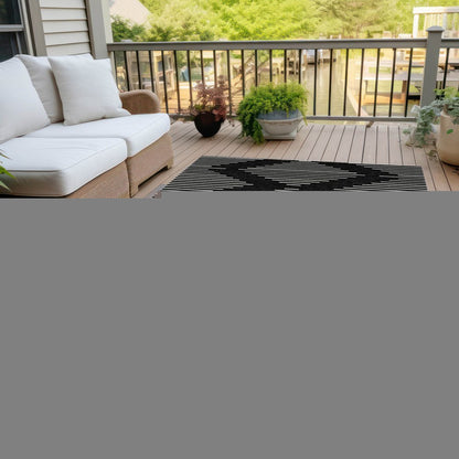 5' X 8' Black And Ivory Geometric Washable Indoor Outdoor Area Rug HomeRoots