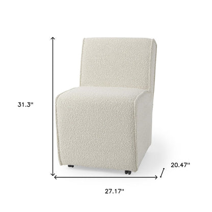 Set of Two Cream Boucle Swivel Dining Side Chairs With Wheels HomeRoots