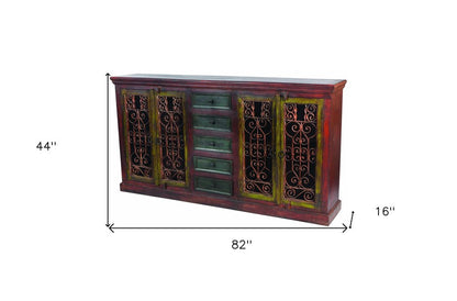82" Brown And Red Distressed Solid Wood And Iron Carved Scrollwork Five Drawer Buffet Table With Four Doors HomeRoots