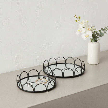 Set of Two Black And Silver Metal And Mirrored Glass Round Vanity Trays HomeRoots