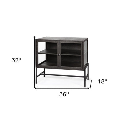 36" Brown and Black Solid Wood and Metal Display Cabinet With Two Doors HomeRoots