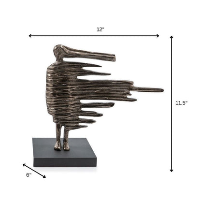 12" Bronze Aluminum Blown Away Woman Tabletop Sculpture HomeRoots