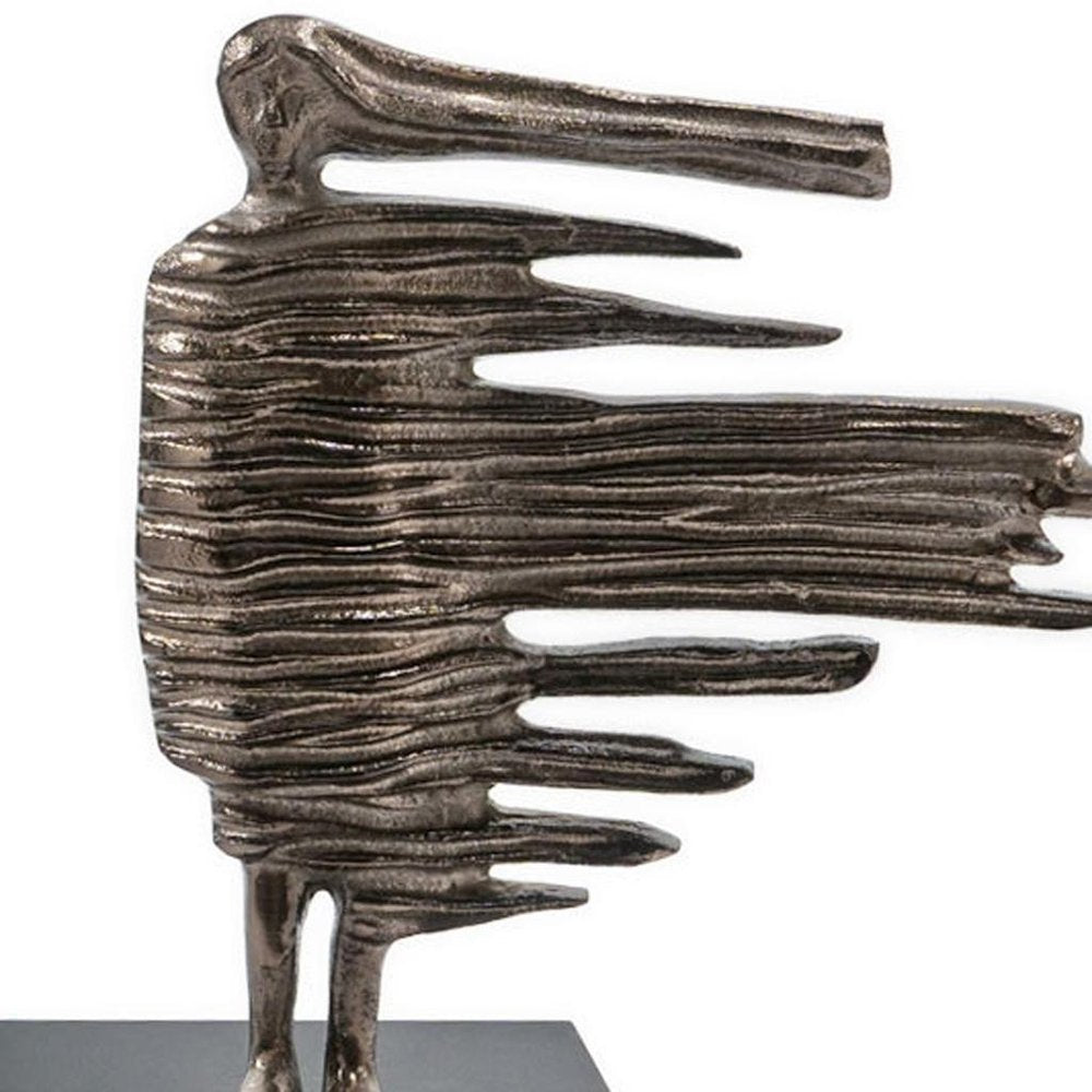 12" Bronze Aluminum Blown Away Woman Tabletop Sculpture HomeRoots