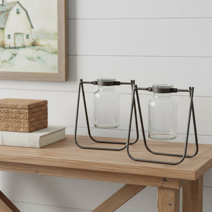 Set of Two Clear And Brown Glass And Metal Round Table Vases HomeRoots