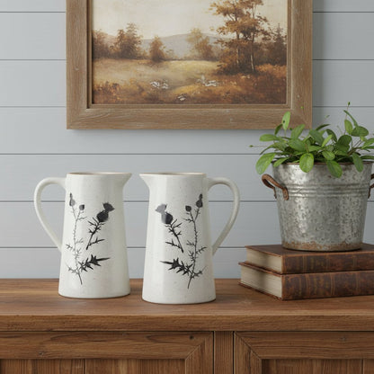 Set of Two Black And Off White Floral Ceramic Cylinder Pitcher Vase HomeRoots