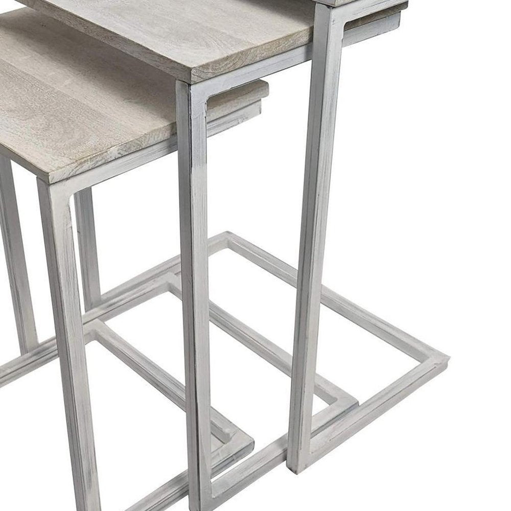 Set of Three Antiqued White Solid Wood and Steel Frame Nested Tables HomeRoots
