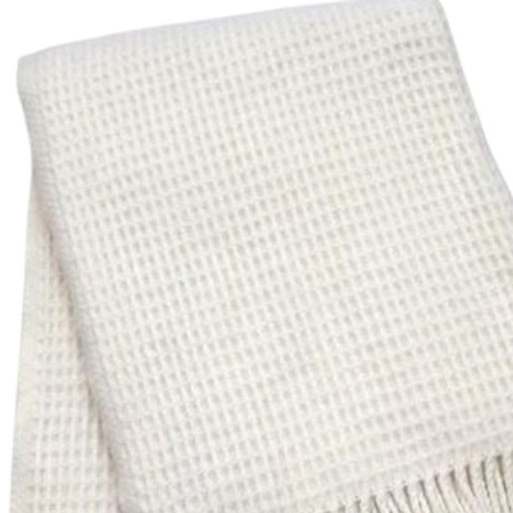 55" X 70" Cream Cotton Blend Waffle Weave Throw Blanket with Fringe HomeRoots