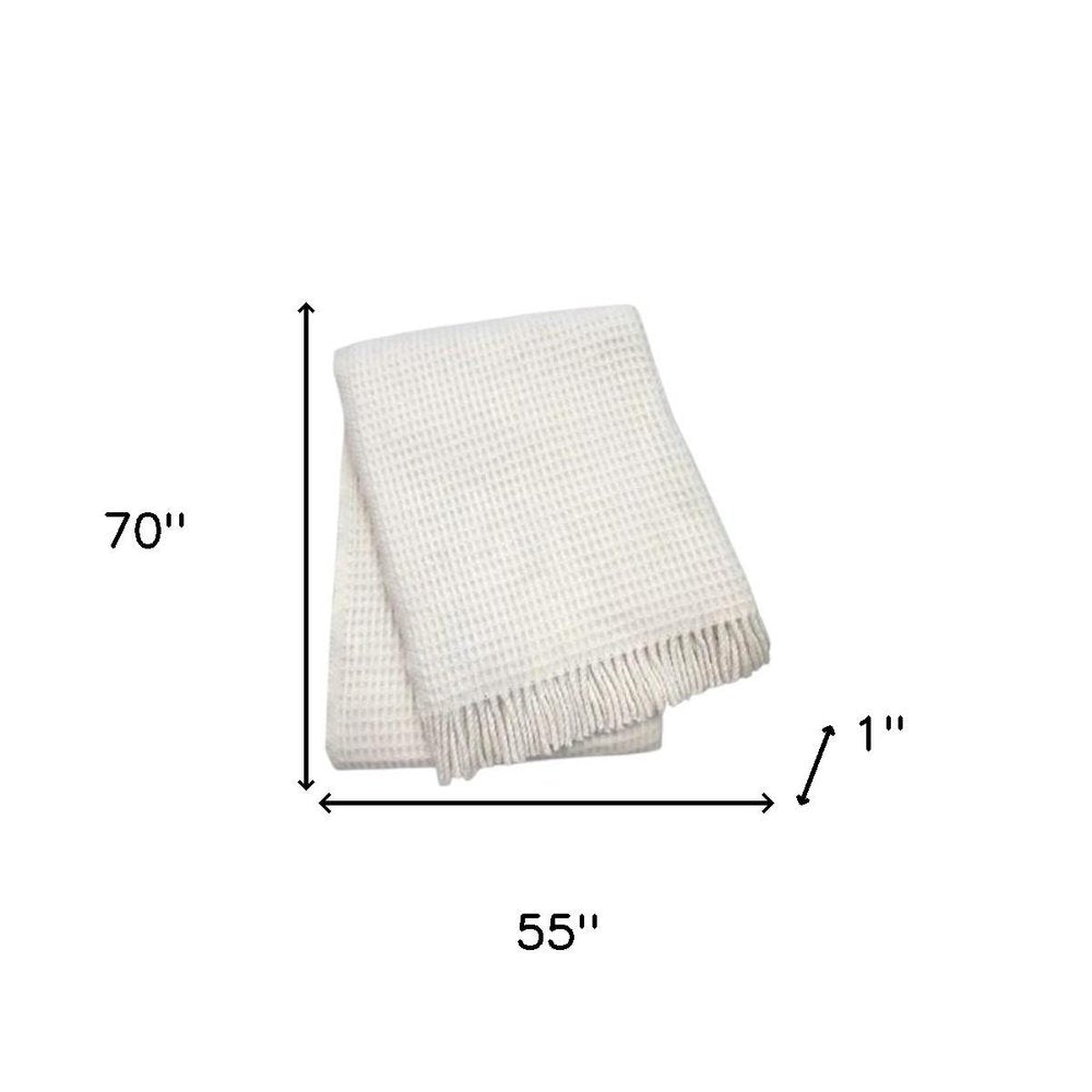55" X 70" Cream Cotton Blend Waffle Weave Throw Blanket with Fringe HomeRoots
