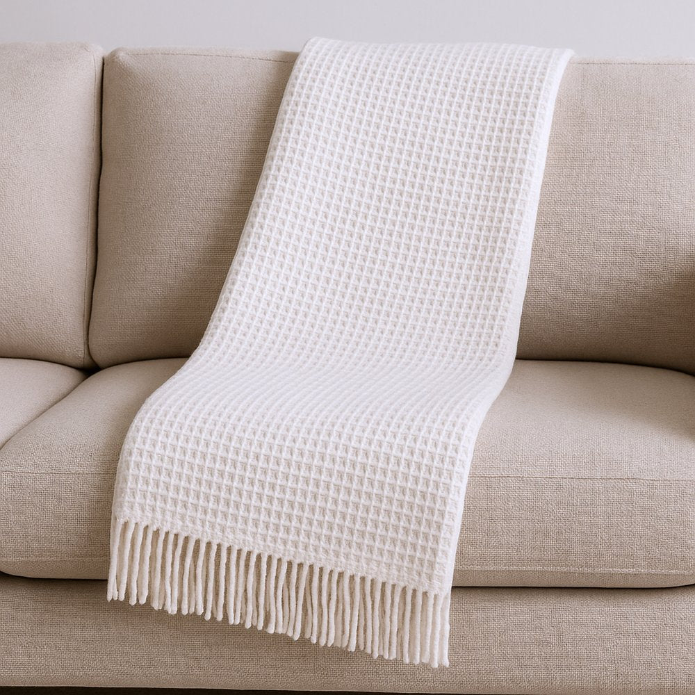 55" X 70" Cream Cotton Blend Waffle Weave Throw Blanket with Fringe HomeRoots