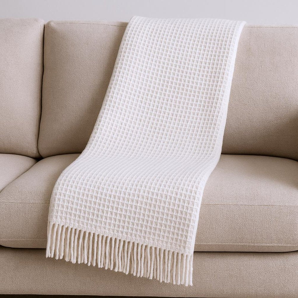 55" X 70" Cream Cotton Blend Waffle Weave Throw Blanket with Fringe HomeRoots