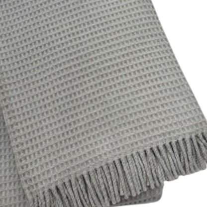55" X 70" Light Gray Cotton Blend Waffle Weave Throw Blanket with Fringe HomeRoots