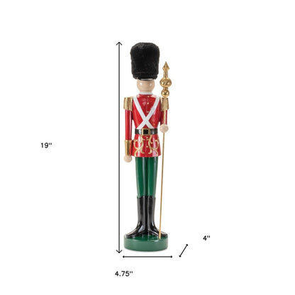 19" Black Red And Green Resin Christmas Nutcracker Tabletop Sculpture HomeRoots