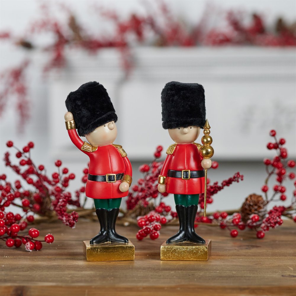 Set of Two Black Gold And Red Polyresin Christmas Nutcracker Figurines HomeRoots