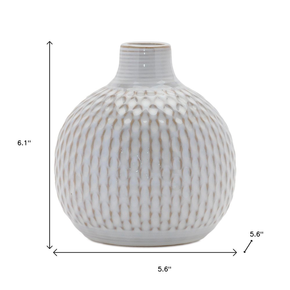Set of Four Natural And Off White Ceramic Bud Vases With Sculptural Details HomeRoots