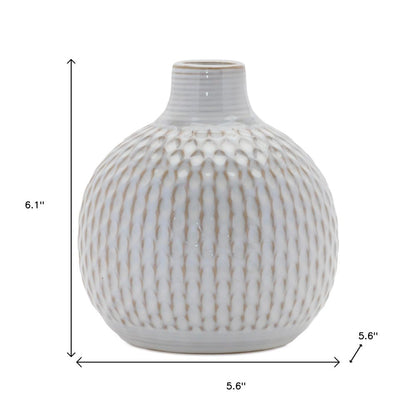 Set of Four Natural And Off White Ceramic Bud Vases With Sculptural Details HomeRoots