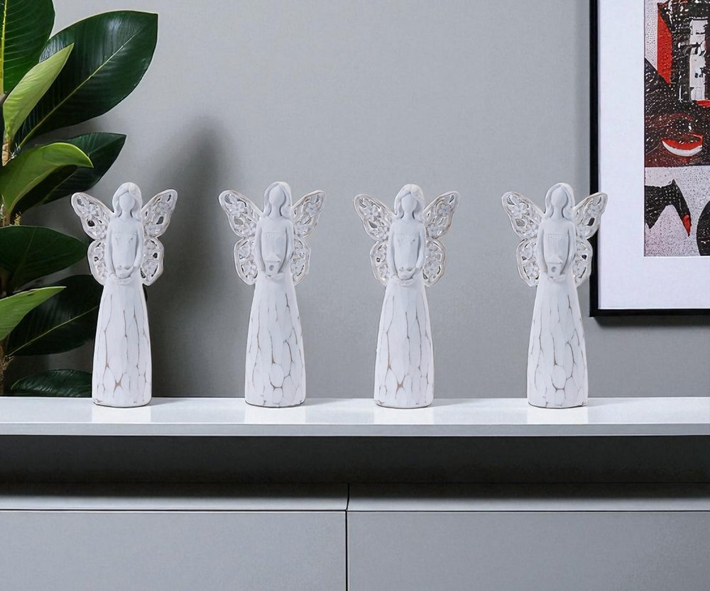 Set of Four White Polyresin Floral Wing Angel Figurines HomeRoots
