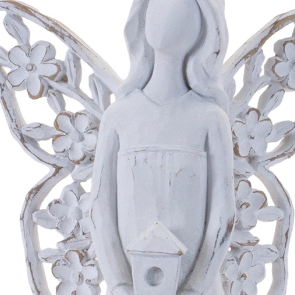 Set of Four White Polyresin Floral Wing Angel Figurines HomeRoots