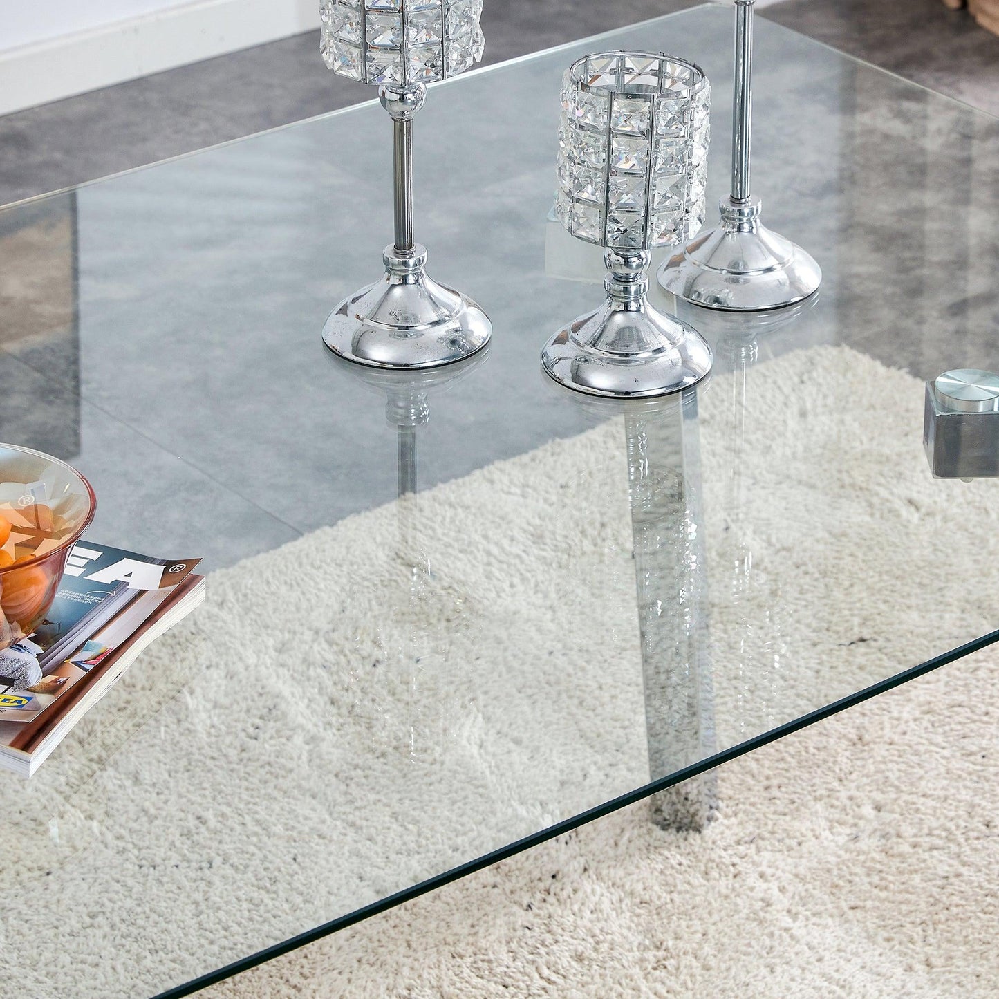 A modern minimalist rectangular glass dining table with tempered glass tabletop and silver metal legs - FurniFindUSA