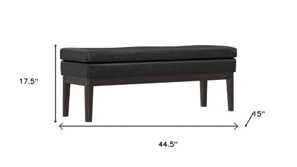 45" Black And Walnut Faux Leather And Solid Wood Upholstered Distressed Bench