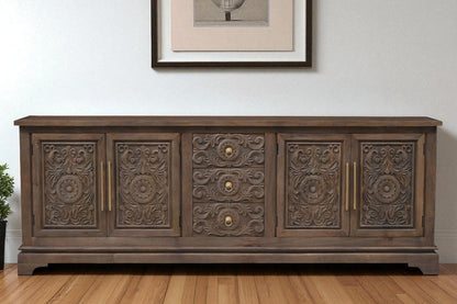 106" Brown Distressed Solid Wood Carved Floral Three Drawer Sideboard with Four Doors HomeRoots