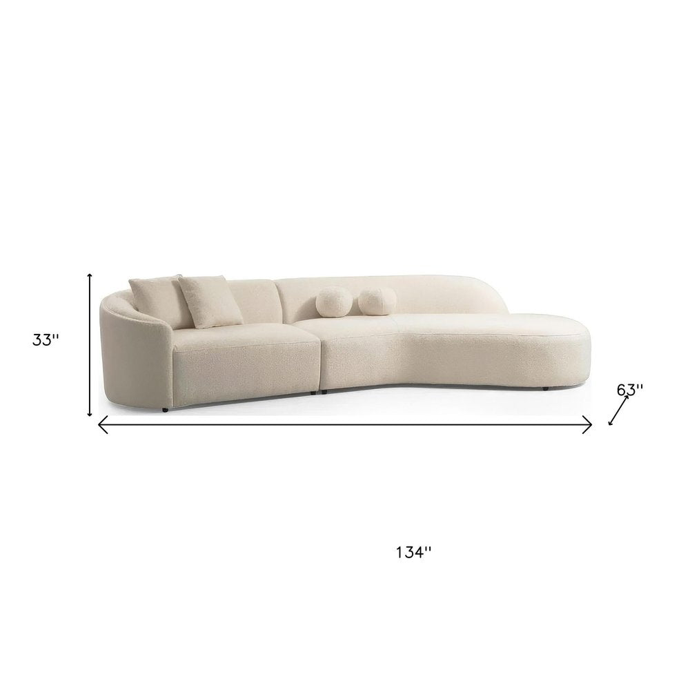 Ivory Boucle Modular Curved Two Piece Sofa and Chaise Sectional With Toss Pillows HomeRoots