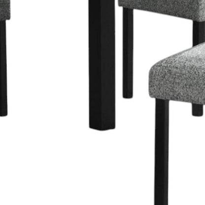 Five Piece White and Black Faux Marble Dining Set with Four Chairs HomeRoots