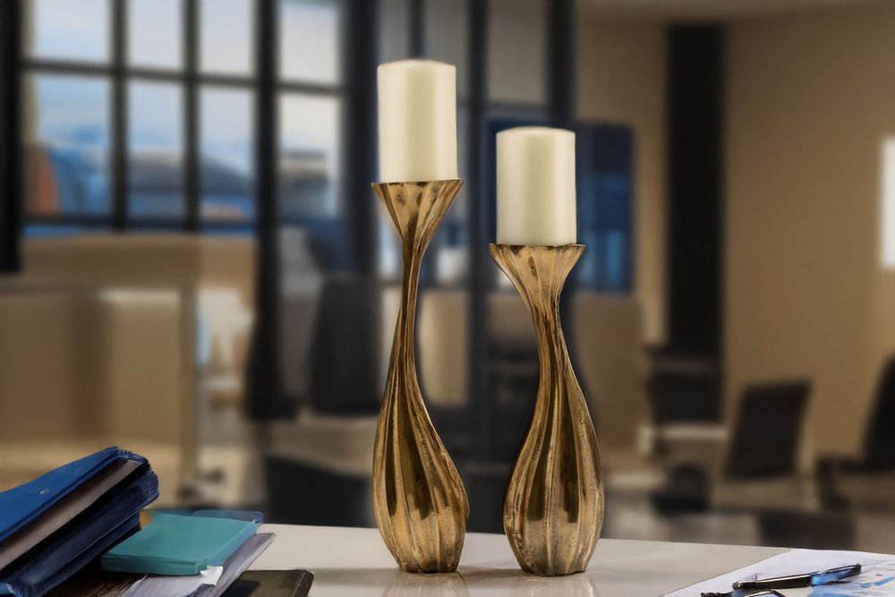 Set of Two Antiqued Gold Aluminum Wavy Faceted Tabletop Pillar Candle Holders HomeRoots