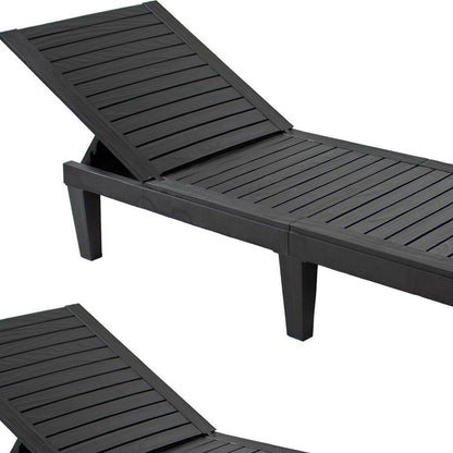 Set of Two Black Heavy Duty Resin Outdoor Chaise Lounges HomeRoots