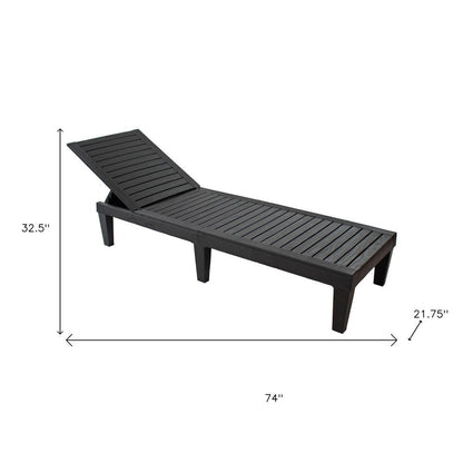 Set of Two Black Heavy Duty Resin Outdoor Chaise Lounges HomeRoots