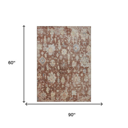 5' X 8' Rust Beige And Blue Floral Washable Indoor Outdoor Area Rug