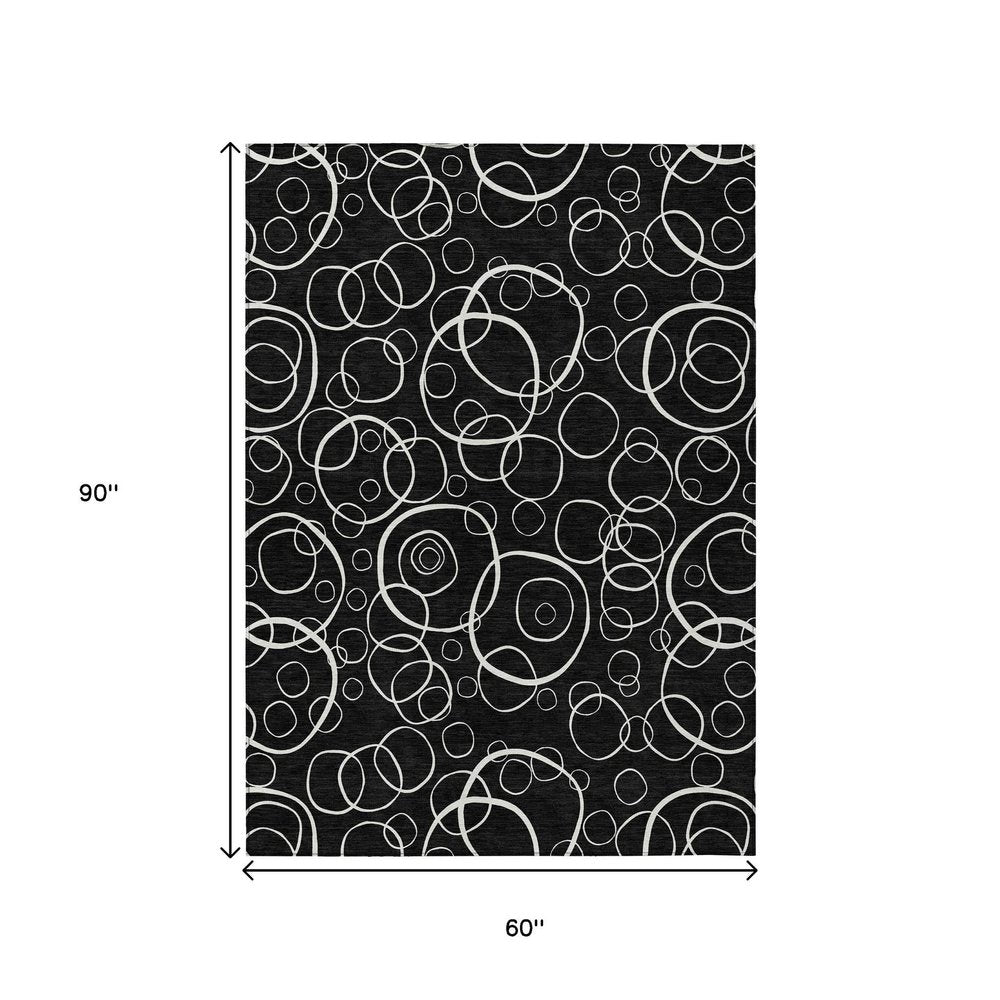 5' X 8' Black And Ivory Geometric Washable Indoor Outdoor Area Rug HomeRoots