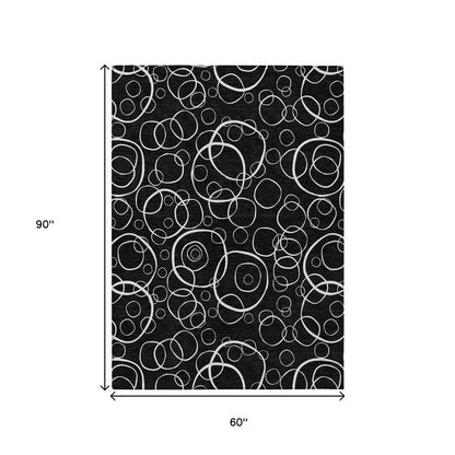 5' X 8' Black And Ivory Geometric Washable Indoor Outdoor Area Rug HomeRoots