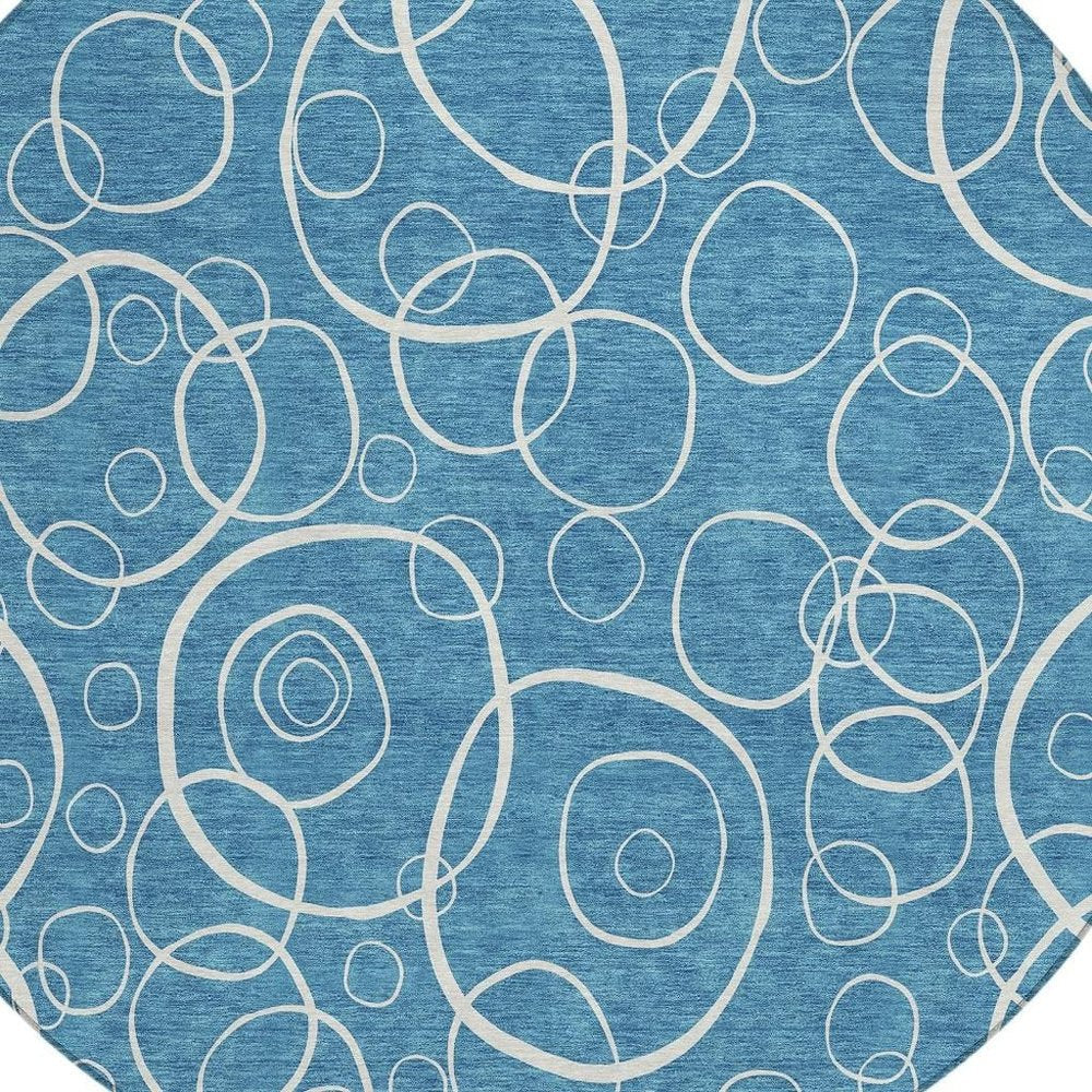8' Teal Blue And Ivory Round Geometric Washable Indoor Outdoor Area Rug HomeRoots