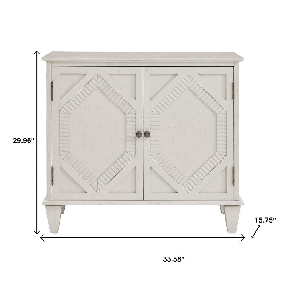 34" White Wood Carved Geometric Accent Cabinet With Two Doors HomeRoots