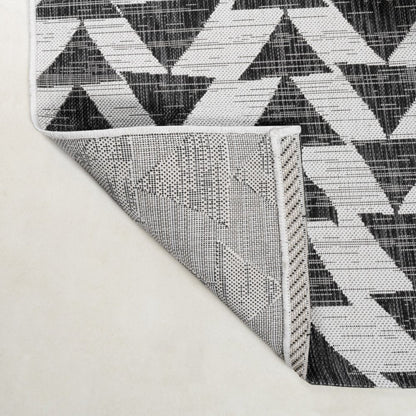 10' Ivory And Black Geometric Indoor Outdoor Runner Rug
